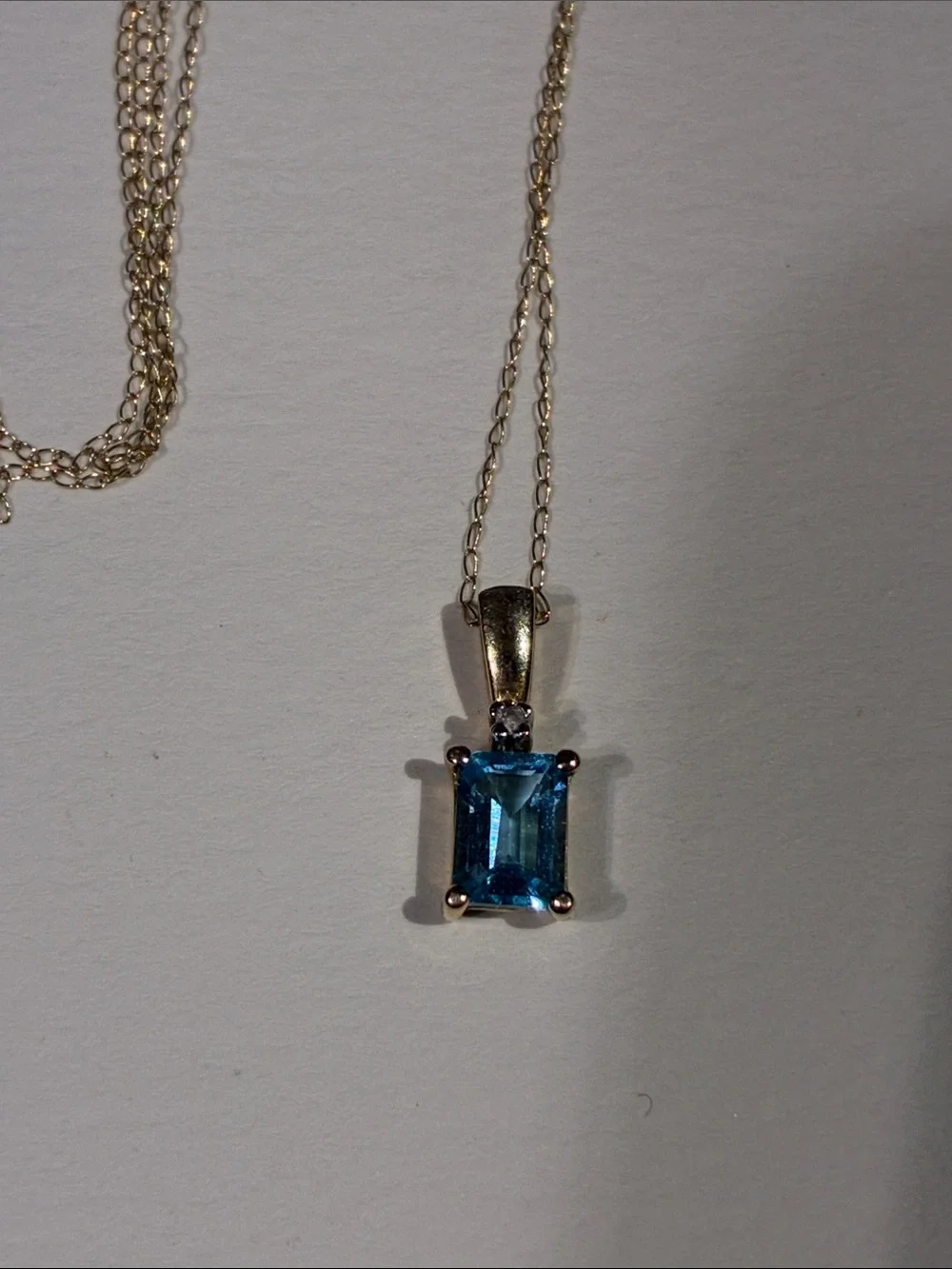 10K  Blue Emerald-Cut Topaz Pendant Necklace and 19 Inch 10K Chain 1.38 Grams